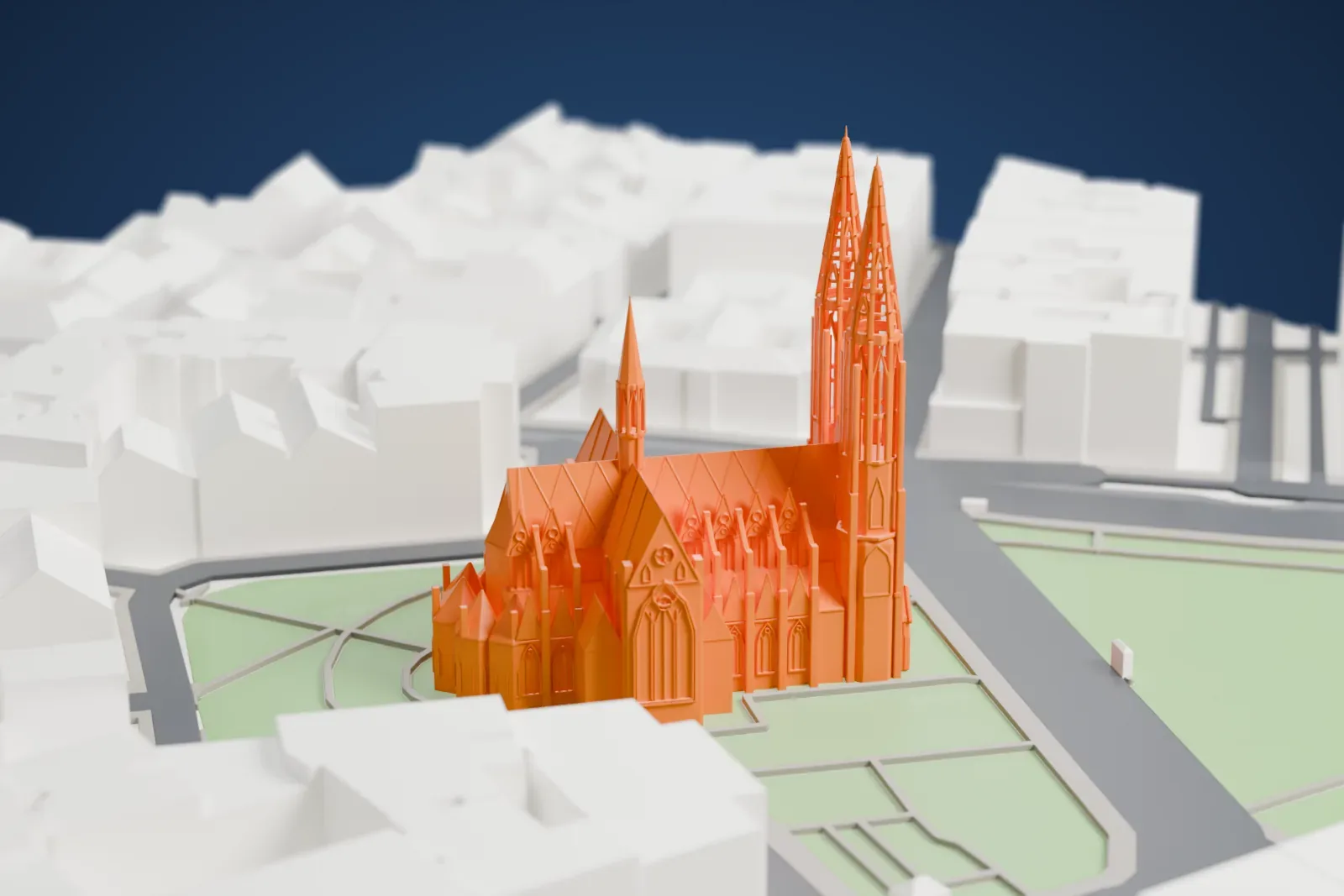 A white 3D print of the Votivkirche standing among the surrounding streets and buildings of central Vienna.