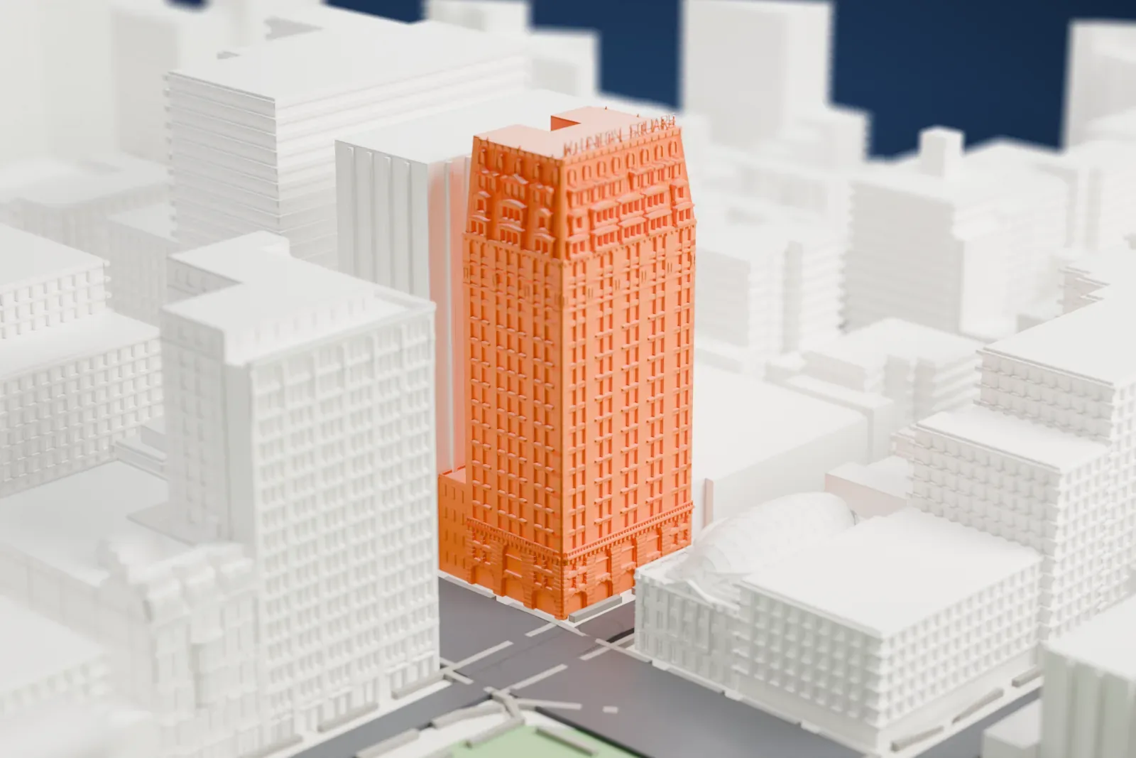 A white 3D print of W New York Union Square, a tall tower with an ornate crown, rising among taller and lower buildings near a green park.