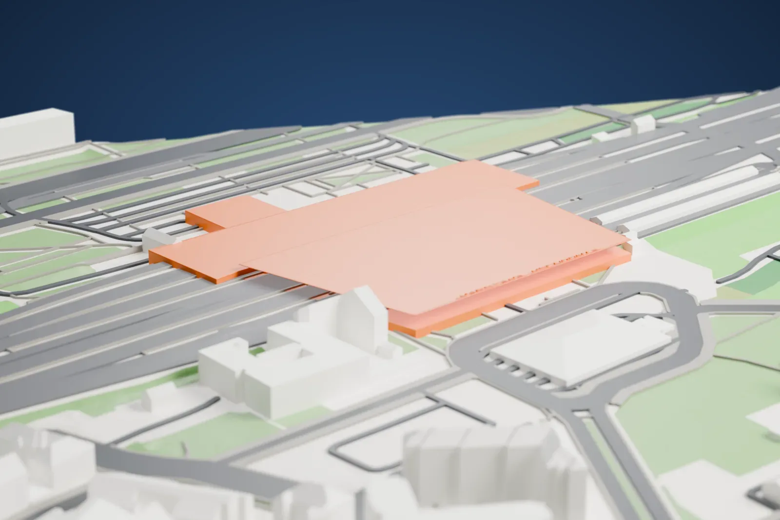 A white 3D print of Warszawa Wschodnia station, a station building, among the surrounding city streets and buildings.