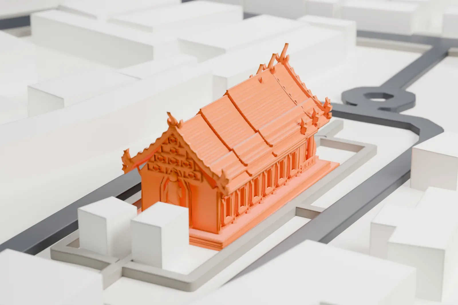 A white 3D print of Wat Rong Suea Ten, a temple with a stupa behind it, set among the surrounding buildings.