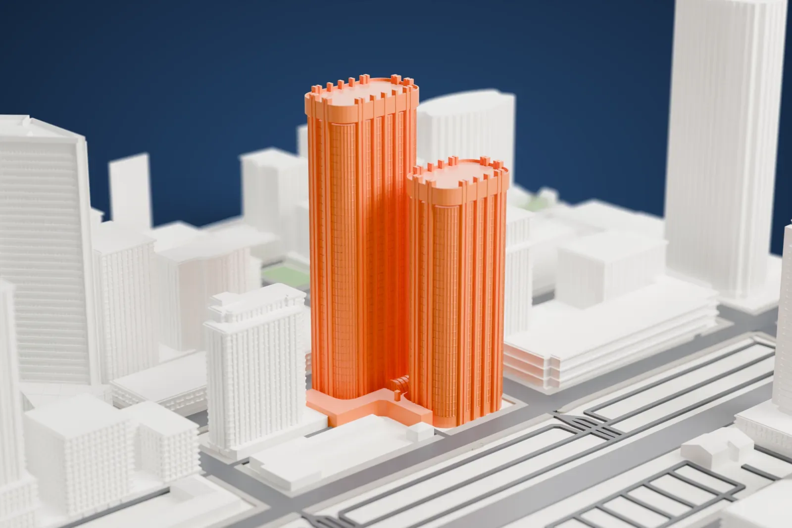 A white 3D print of Western Canadian Place, two office towers among the surrounding streets and buildings.