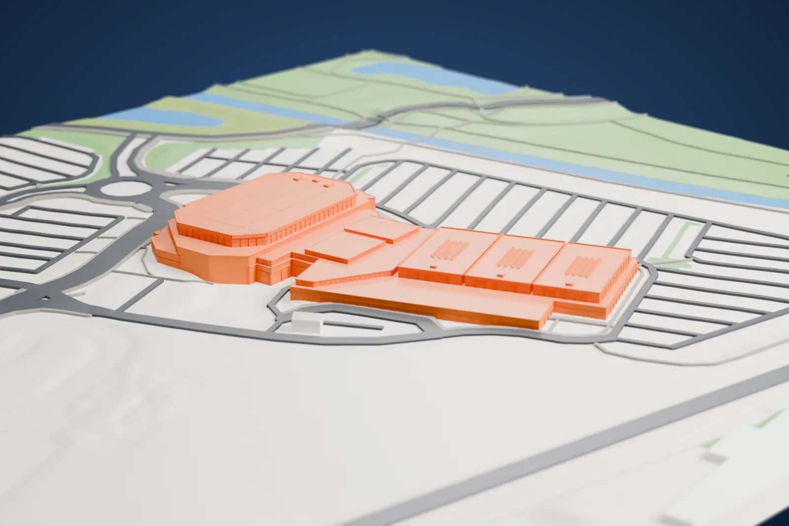 A white 3D print of the WFCU Centre among the surrounding streets and buildings.