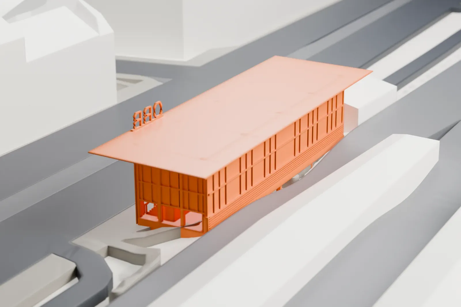 A white 3D print of Wien Meidling railway station, set among the surrounding streets and buildings.