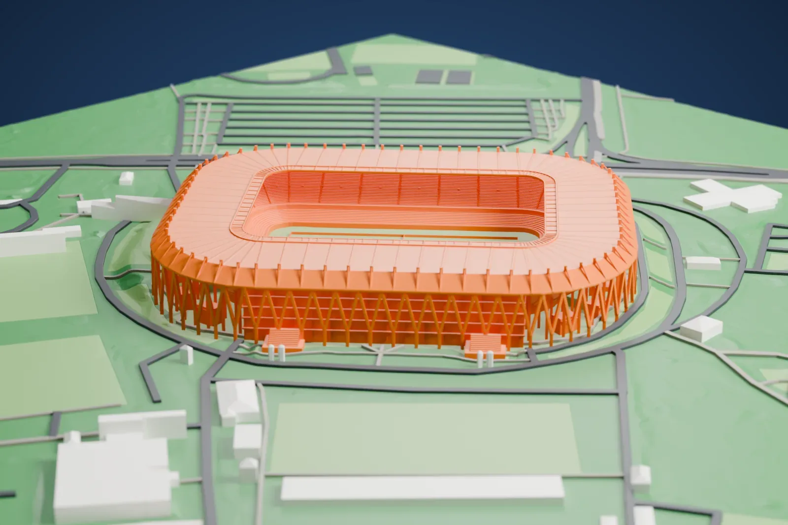 A white 3D print of Wildparkstadion, a football stadium with a continuous rounded roof carried on branching white supports, among surrounding buildings.