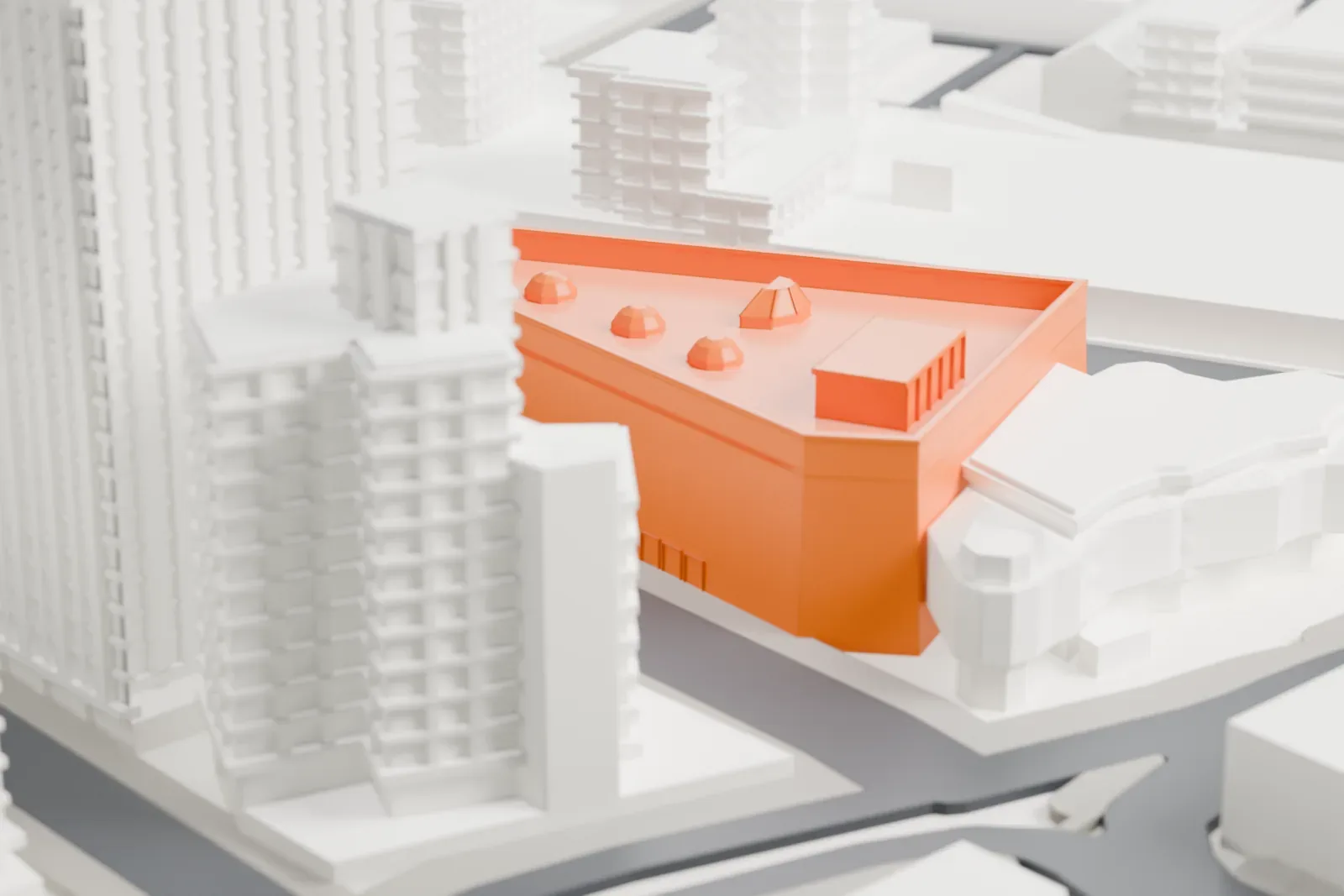 A white 3D print of the Winnipeg Art Gallery with the surrounding streets and buildings.