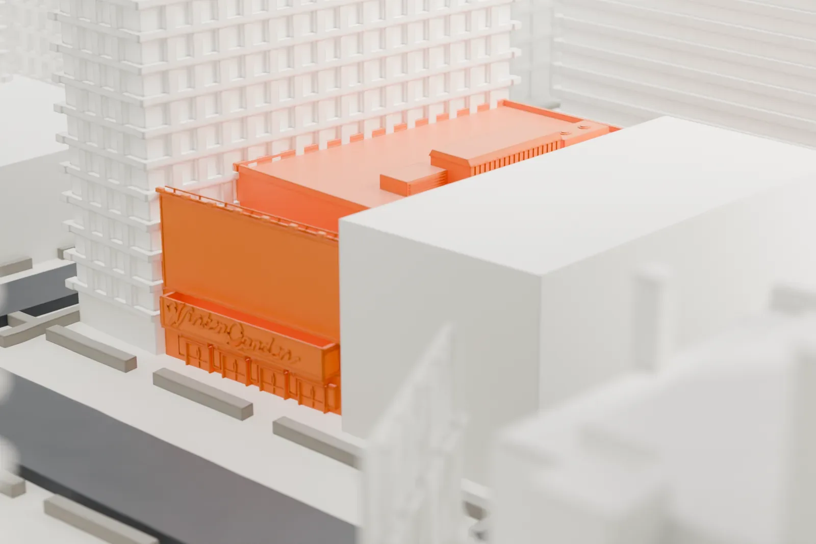 A white 3D print of the Winter Garden Theatre, a low building almost entirely hidden between much taller Midtown towers.