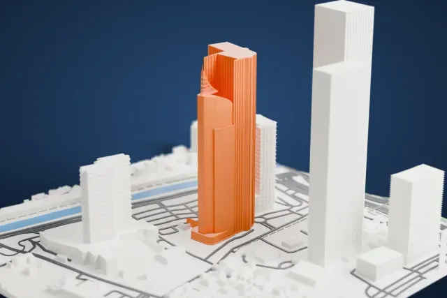 A white 3D print of Wisma 46, a tall curved glass-grid tower topped by a slim lattice spire, among neighboring towers, low houses and a waterway.