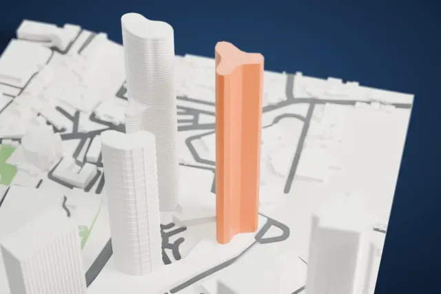 A white 3D print of World One, a very tall rounded tower with fine horizontal floor bands, standing beside other tall towers with roads and low buildings around it.