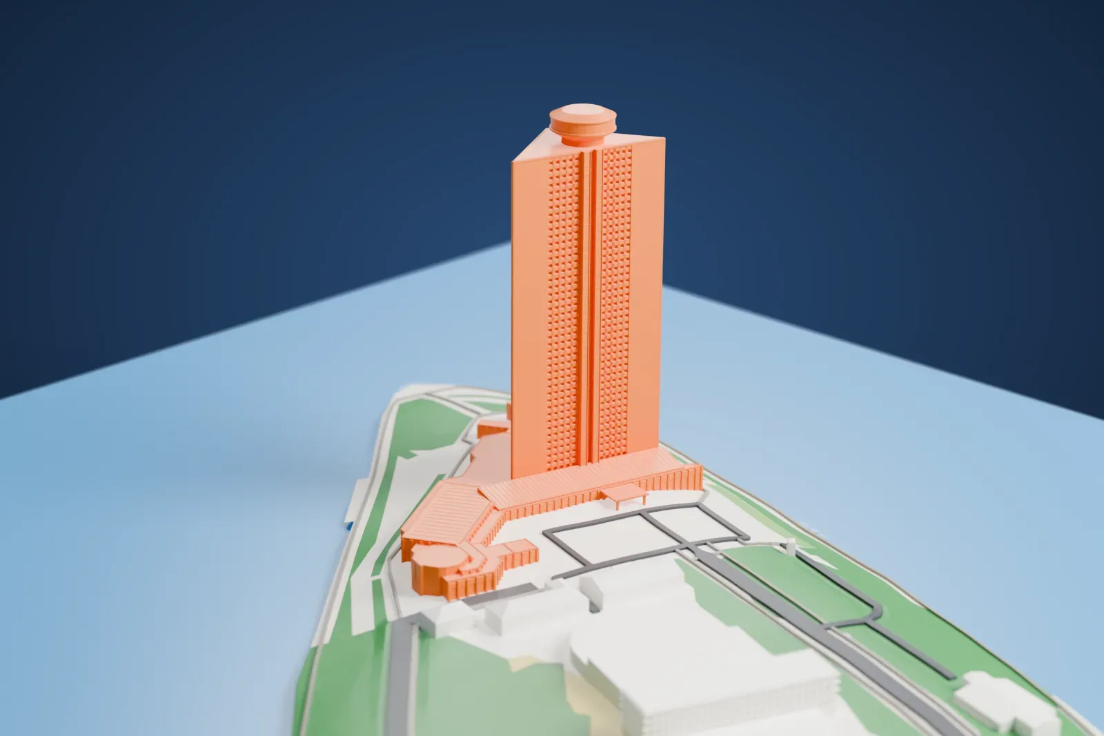 A white 3D print of the Yanggakdo International Hotel, its triangular tower and circular rooftop restaurant rising above Yanggak Island and the River Taedong in Pyongyang.