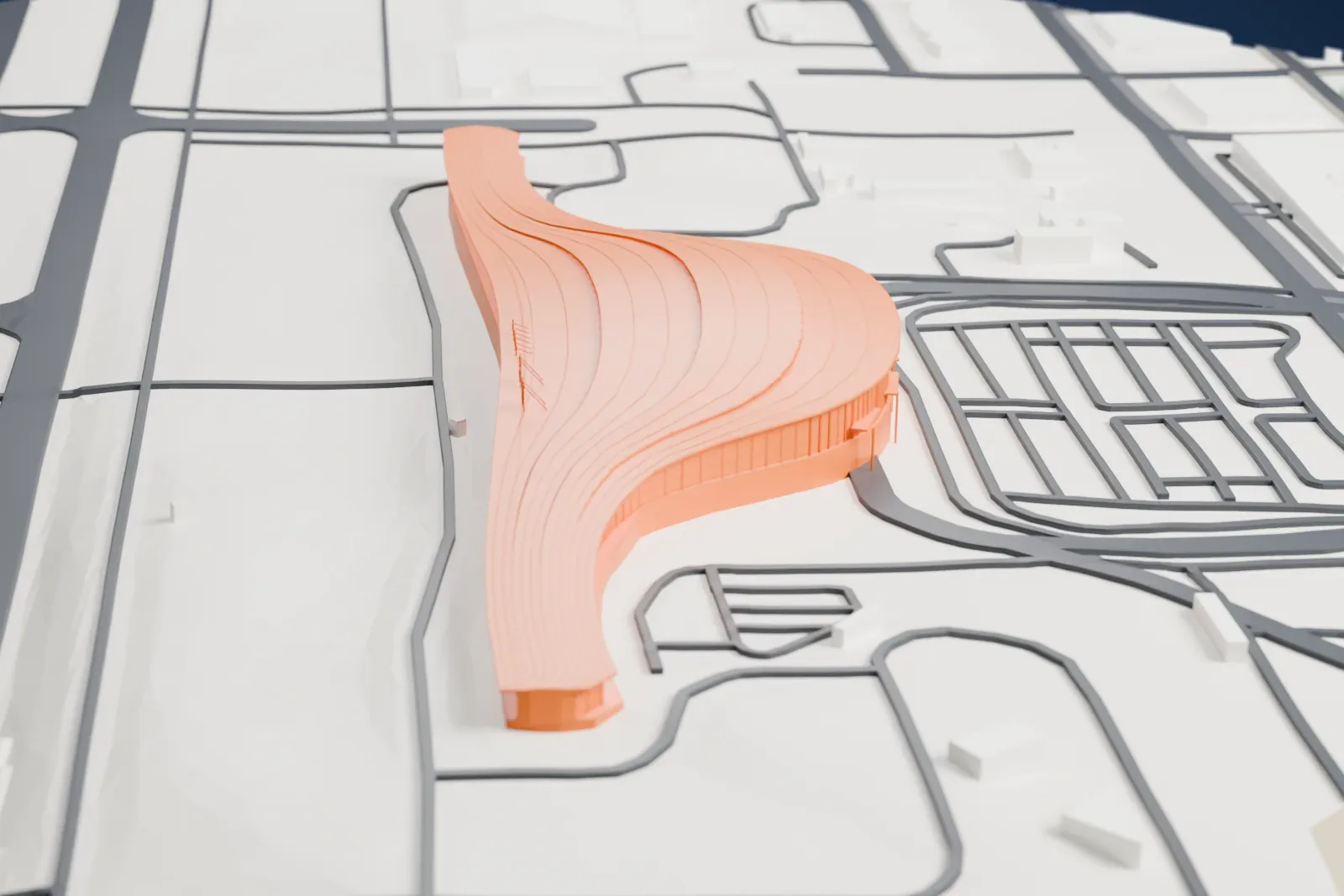 A white 3D print of Yantai Penglai International Airport Terminal 1 among the surrounding streets and buildings.