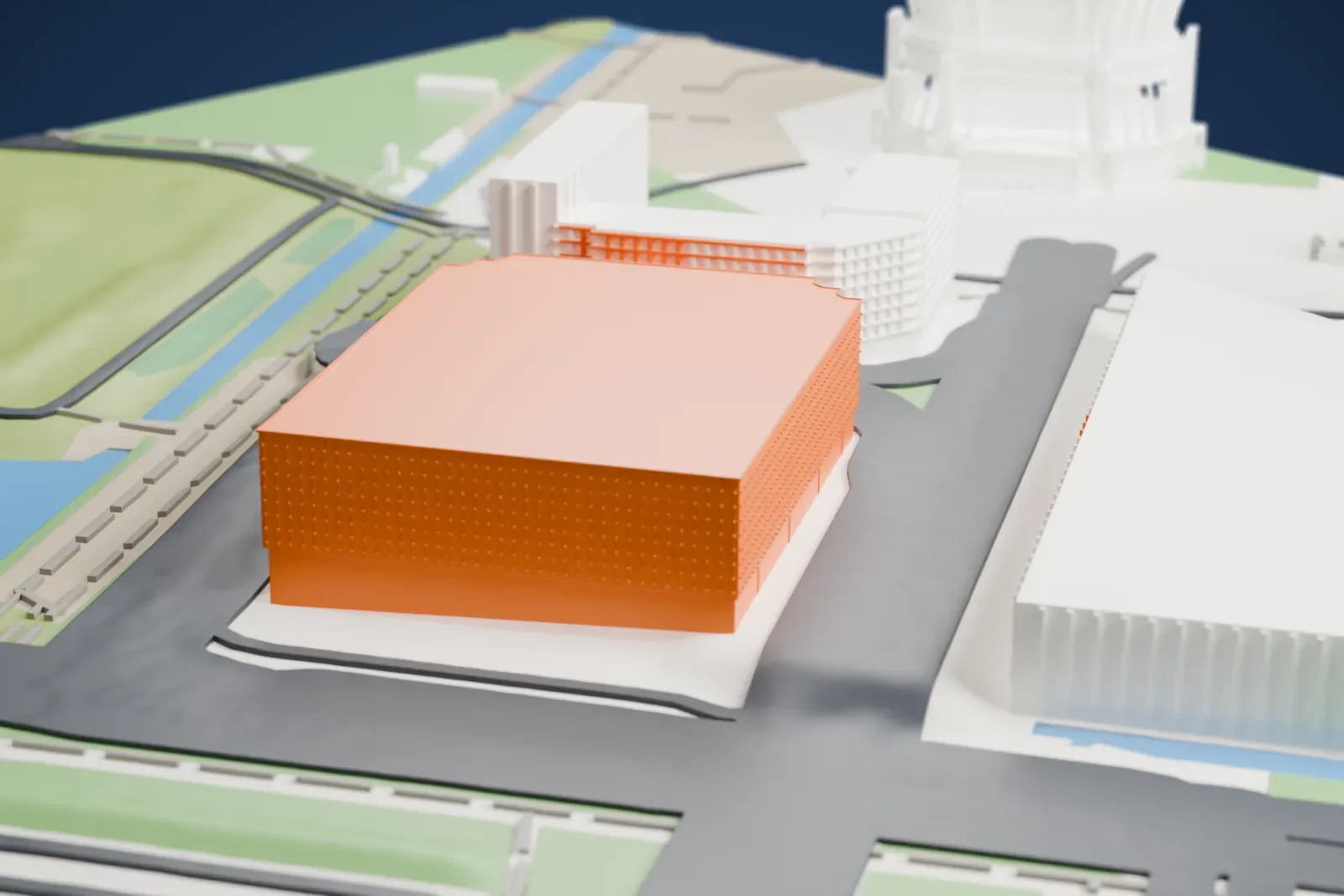 A white 3D print of the Ziggo Dome, a square, block-shaped arena with a flat roof, beside roads, ponds and green lawns, with larger buildings nearby.