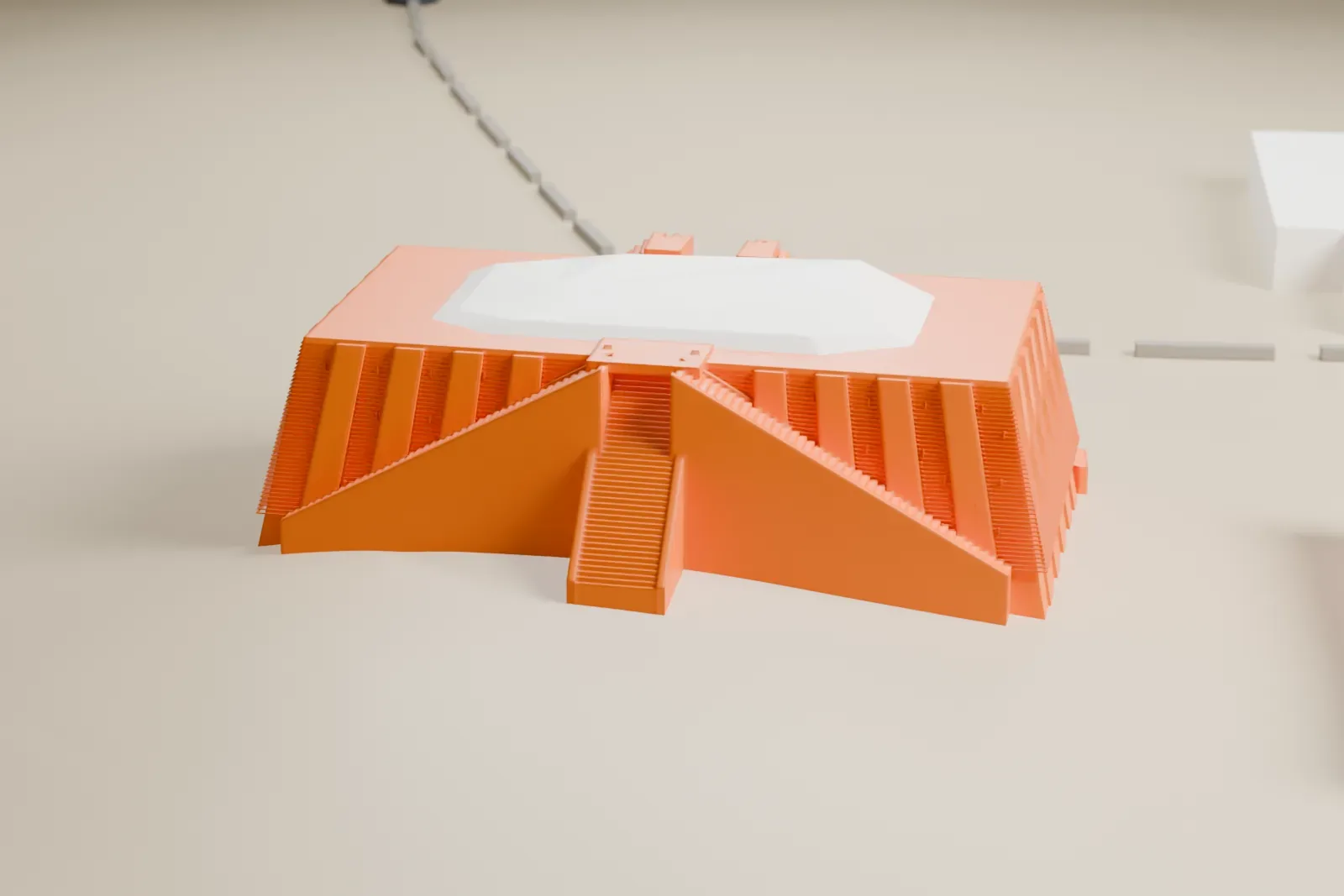 A white 3D print of the Ziggurat of Ur, a terraced platform with long staircases, on bare ground with a few plain buildings and roads nearby.