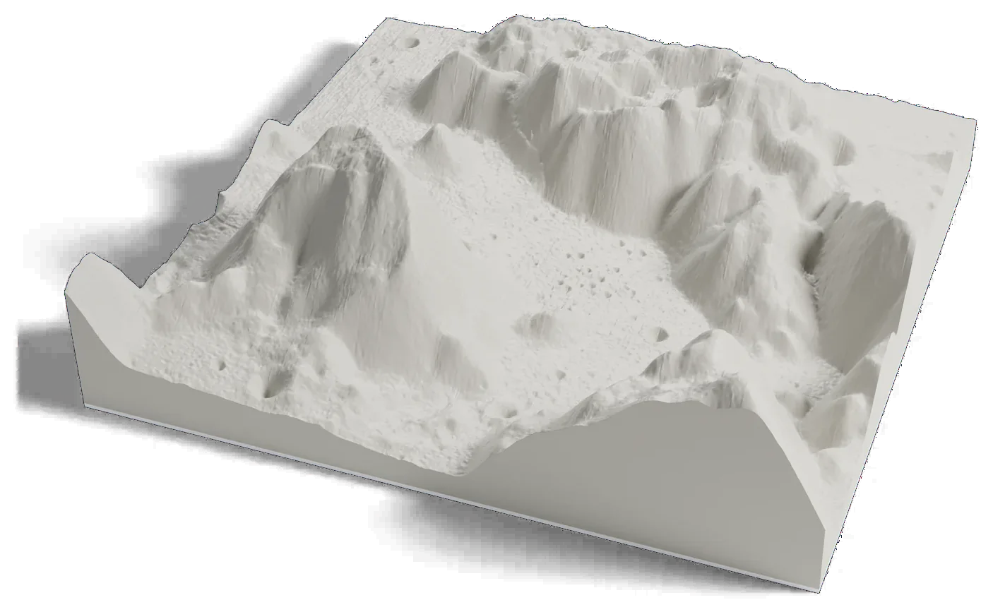 3D printed relief map of the Taurus-Littrow valley on the Moon, a flat valley floor between two tall mountain massifs.