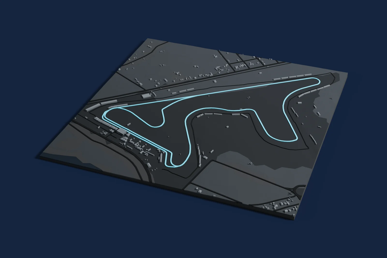 Render of a 3D printed map of Autódromo Termas de Río Hondo, the track in cyan on a dark grey model of the land and buildings around it.
