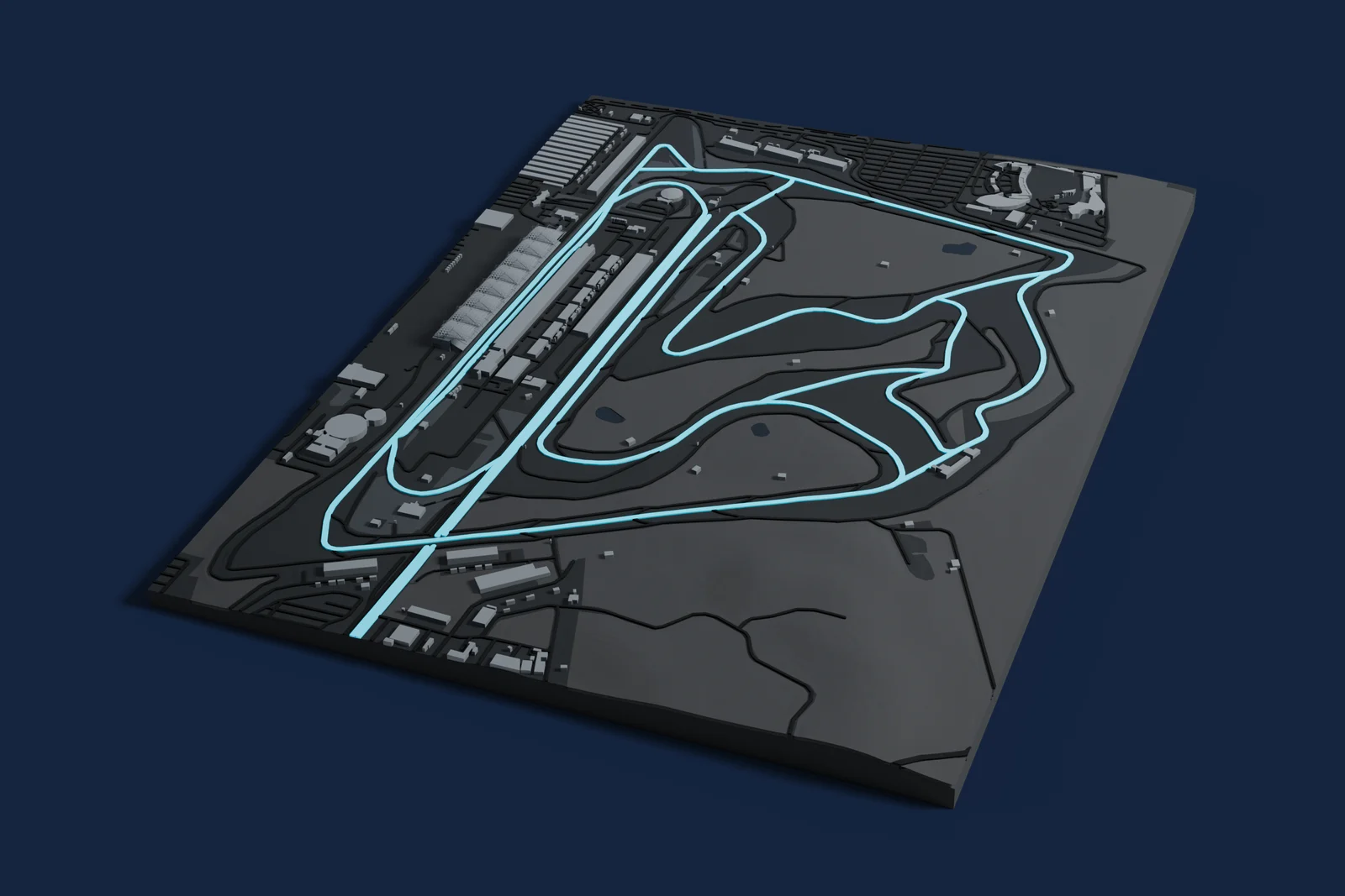 Render of a 3D printed map of Bahrain International Circuit, the track in cyan on a dark grey model of the land and buildings around it.