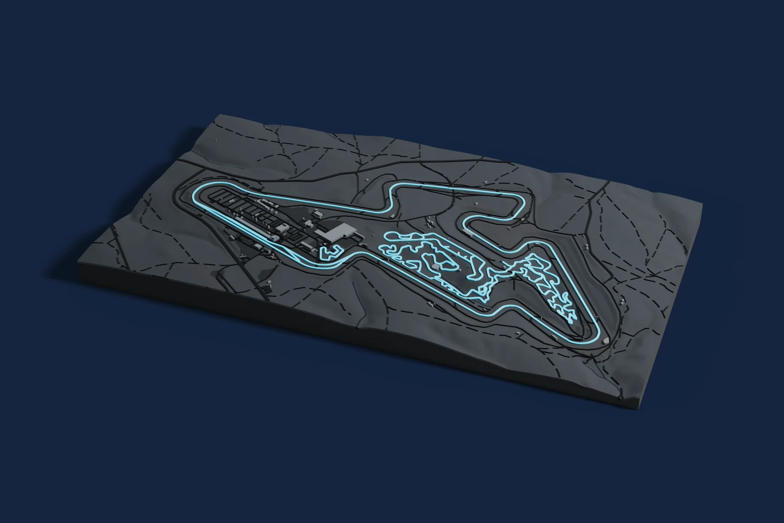 Render of a 3D printed map of Brno Circuit, the track in cyan on a dark grey model of the land and buildings around it.