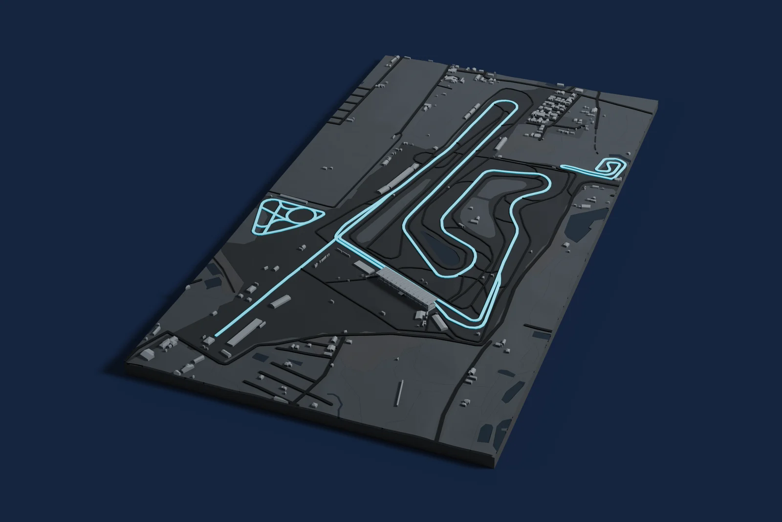 Render of a 3D printed map of Buriram International Circuit, the track in cyan on a dark grey model of the land and buildings around it.