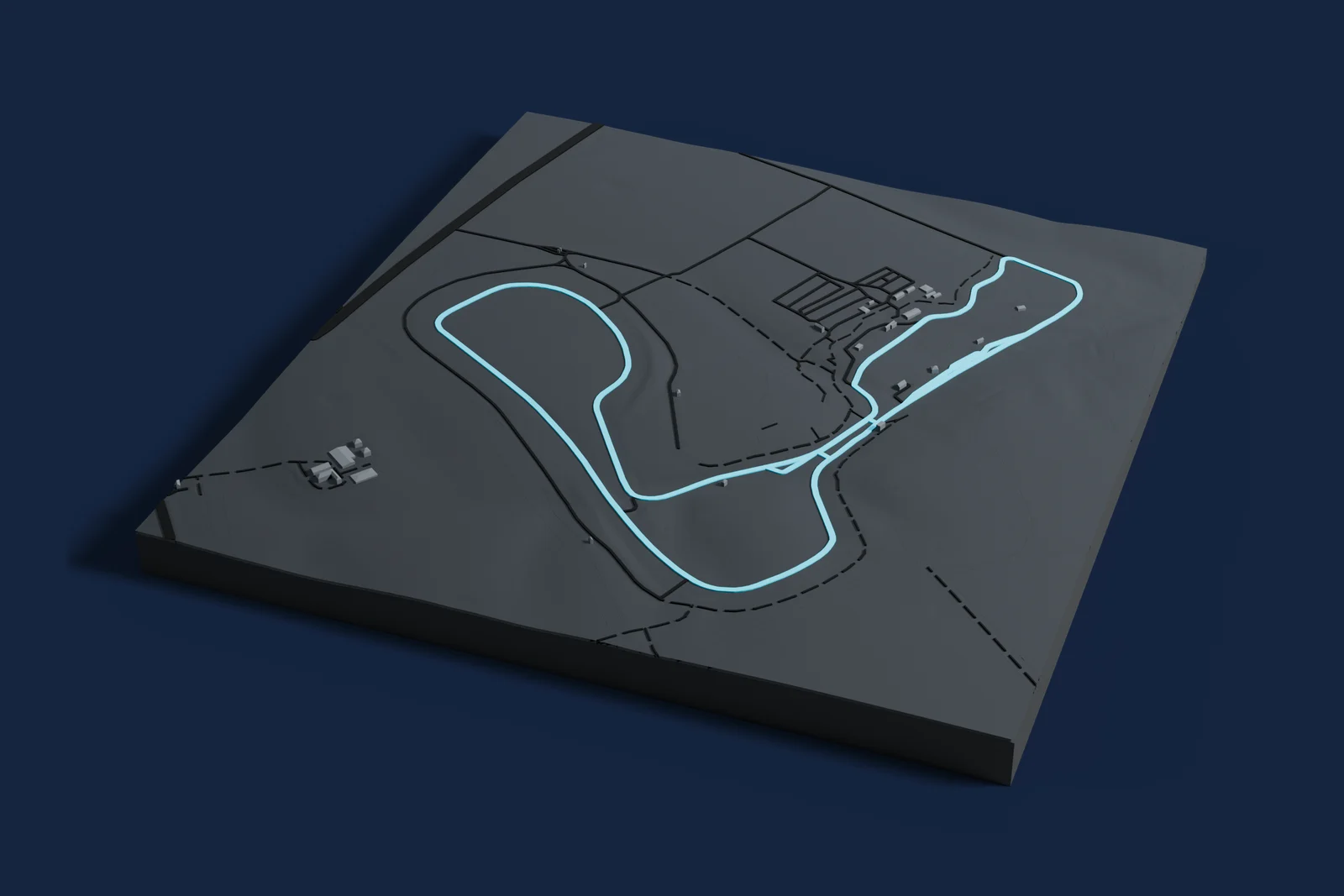 Render of a 3D printed map of Cadwell Park, the track in cyan on a dark grey model of the land and buildings around it.