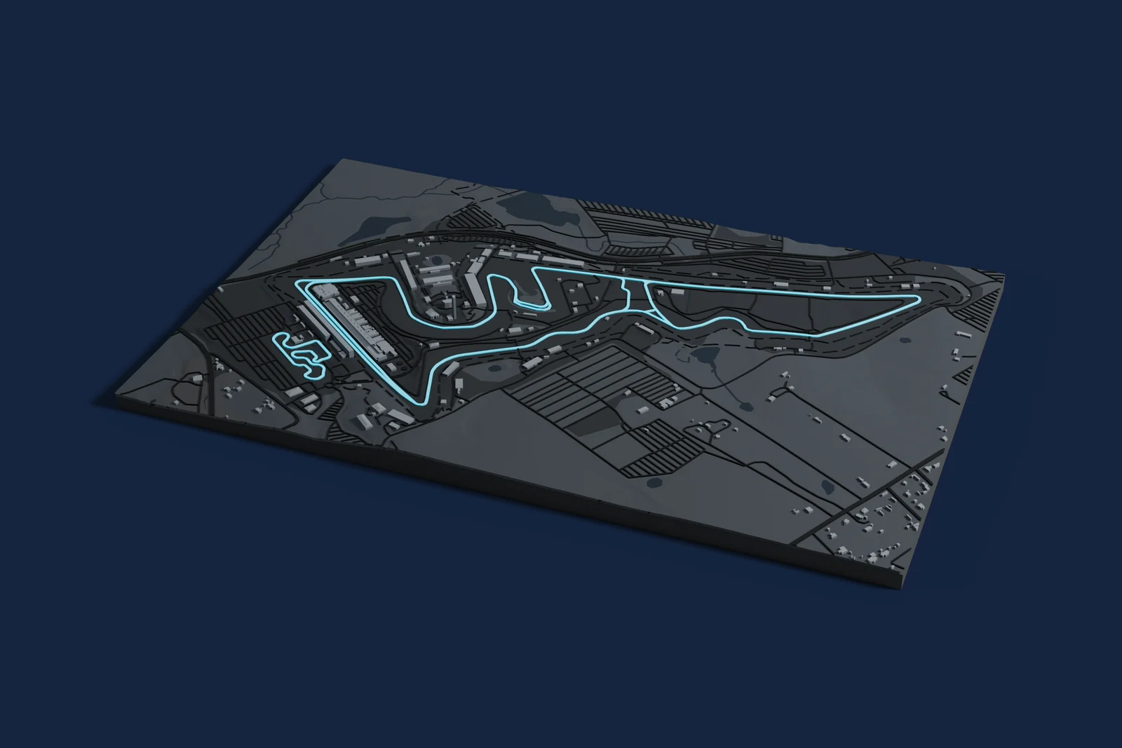 Render of a 3D printed map of Circuit of the Americas, the track in cyan on a dark grey model of the land and buildings around it.