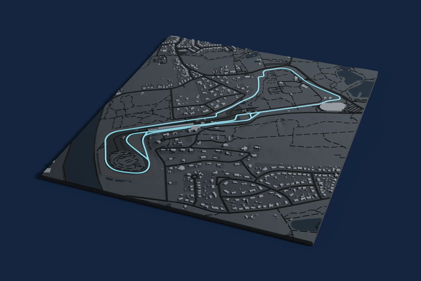 Render of a 3D printed map of Circuit Zolder, the track in cyan on a dark grey model of the land and buildings around it.