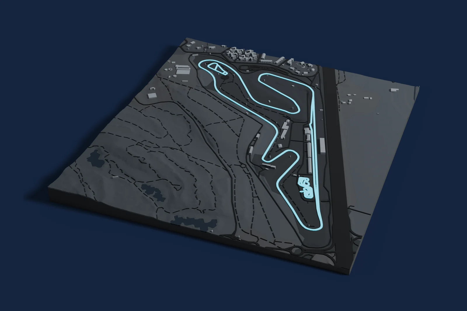 Render of a 3D printed map of Circuito del Jarama, the track in cyan on a dark grey model of the land and buildings around it.