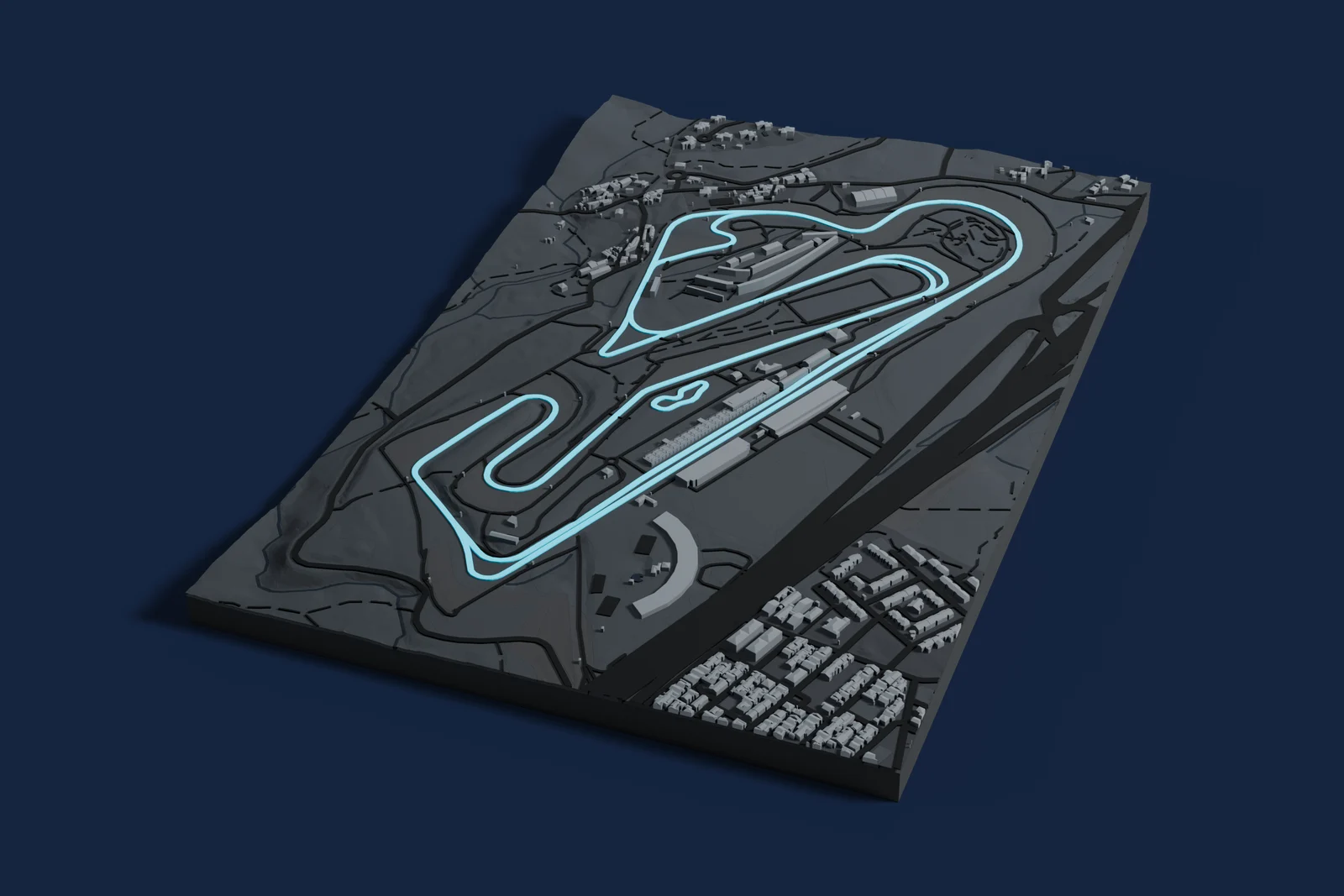 Render of a 3D printed map of Circuito do Estoril, the track in cyan on a dark grey model of the land and buildings around it.