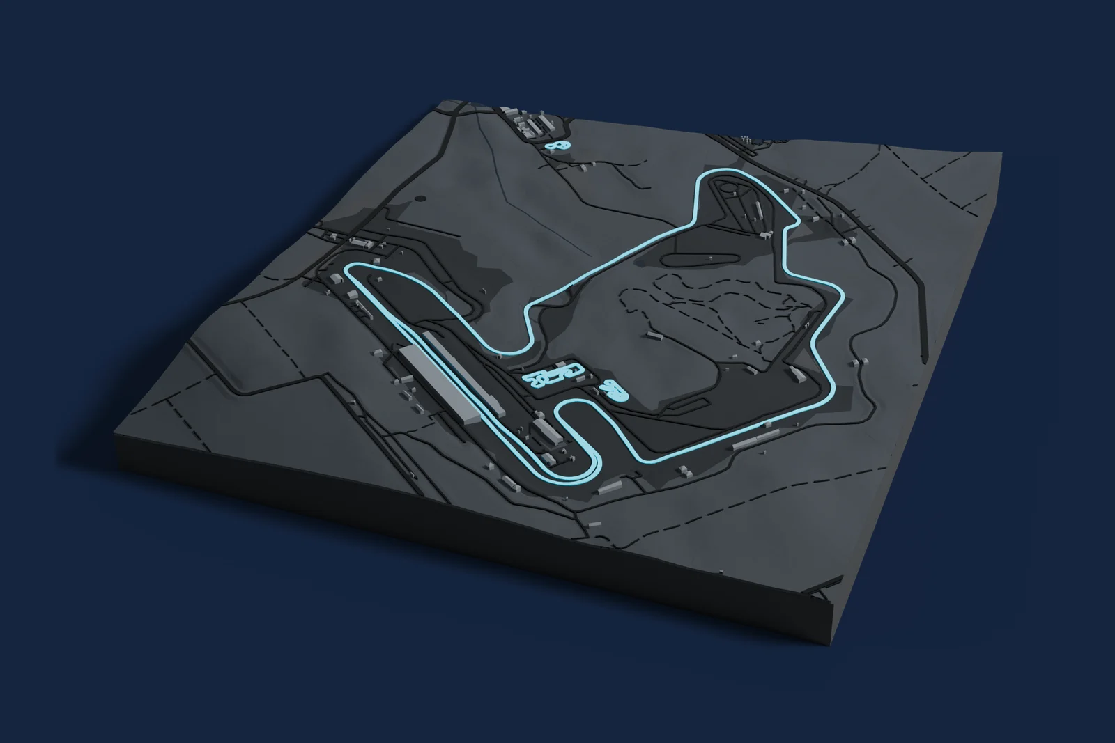 Render of a 3D printed map of Hungaroring, the track in cyan on a dark grey model of the land and buildings around it.