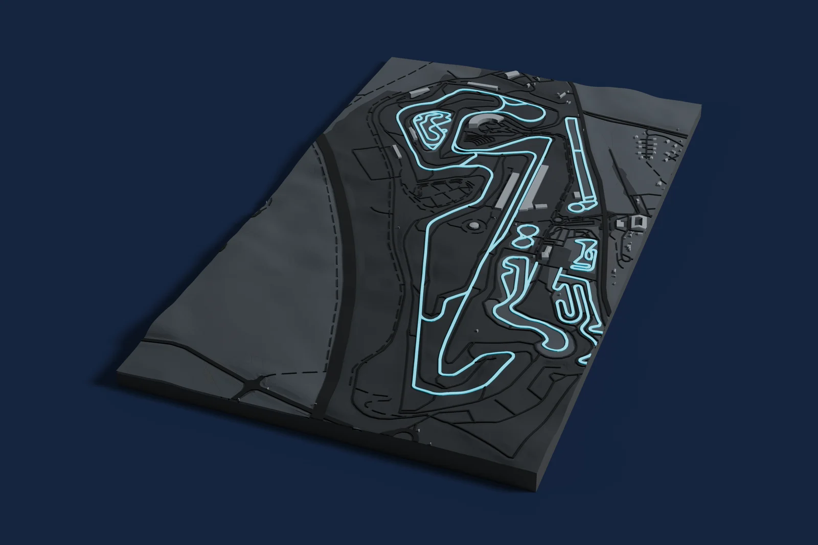 Render of a 3D printed map of Igora Drive, the track in cyan on a dark grey model of the land and buildings around it.