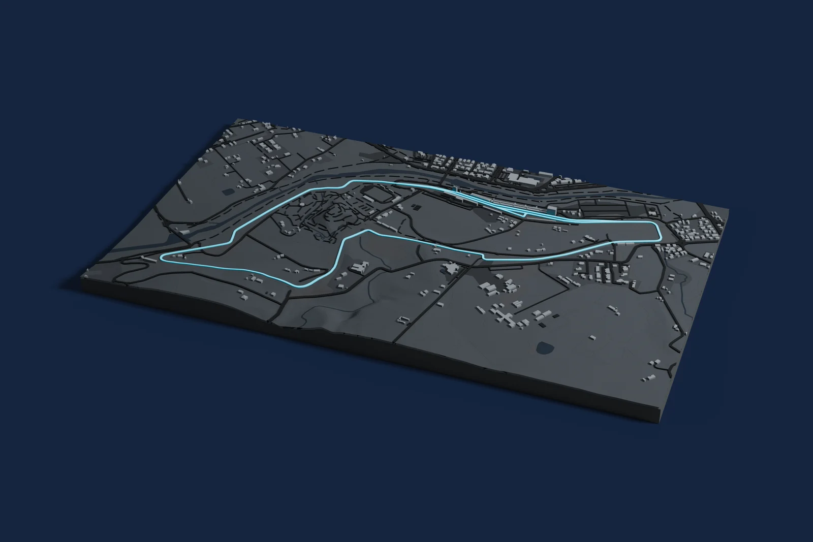 Render of a 3D printed map of Imola Circuit, the track in cyan on a dark grey model of the land and buildings around it.