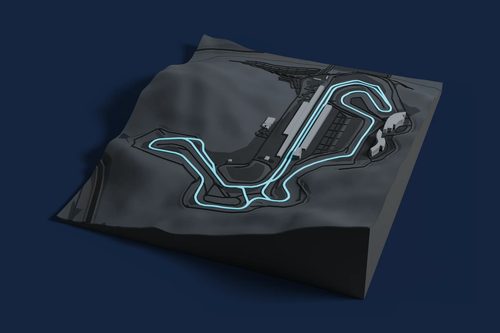 Render of a 3D printed map of Inje Speedium, the track in cyan on a dark grey model of the land and buildings around it.