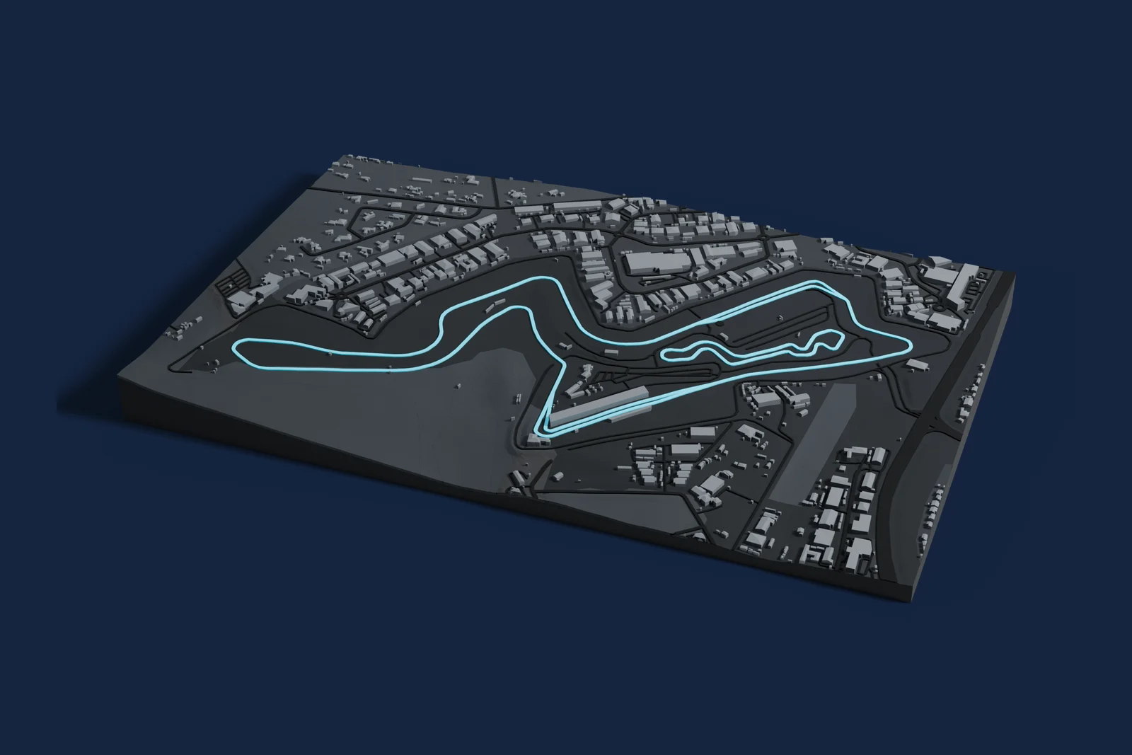 Render of a 3D printed map of Kyalami, the track in cyan on a dark grey model of the land and buildings around it.