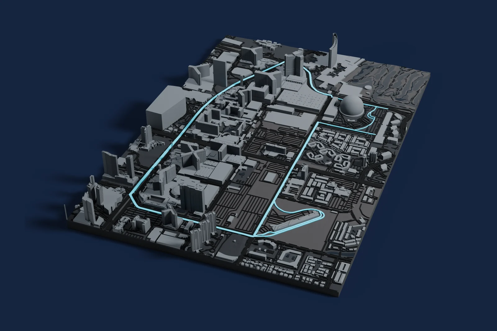 Render of a 3D printed map of Las Vegas Strip Circuit, the track in cyan on a dark grey model of the land and buildings around it.