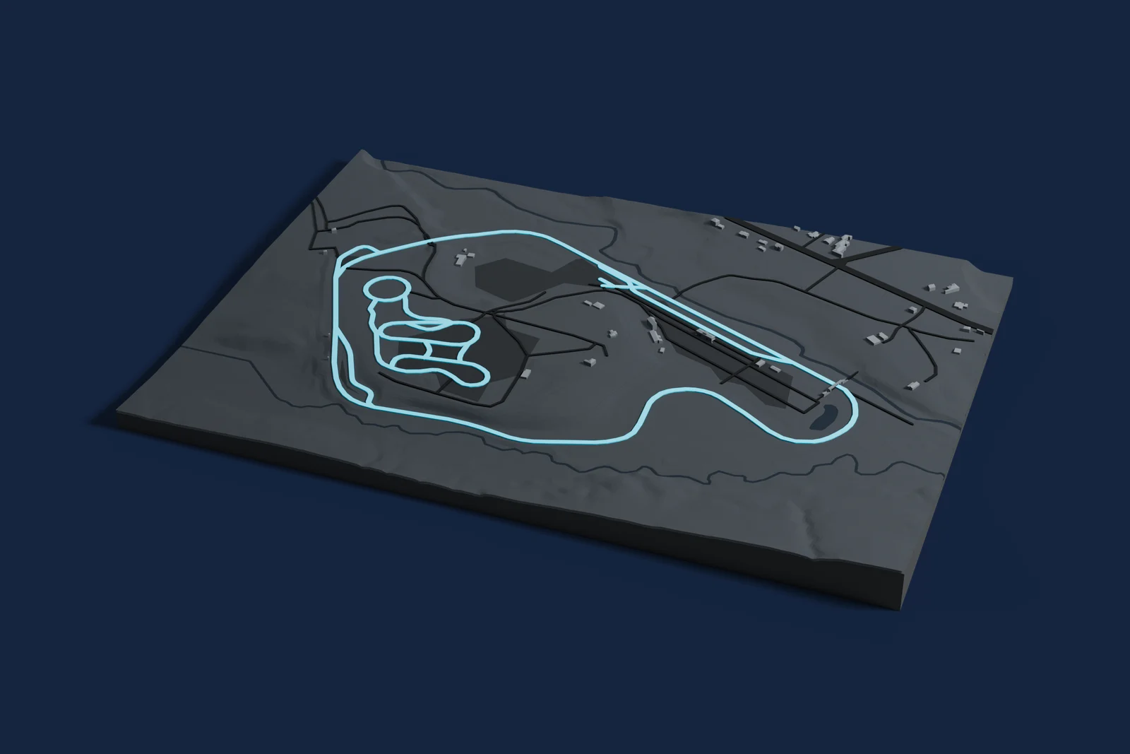 Render of a 3D printed map of Lime Rock Park, the track in cyan on a dark grey model of the land and buildings around it.