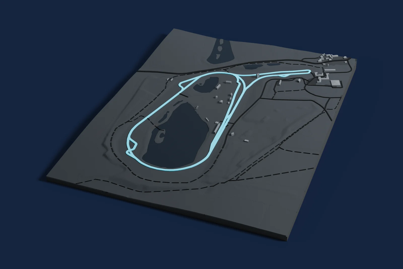 Render of a 3D printed map of Mallory Park, the track in cyan on a dark grey model of the land and buildings around it.