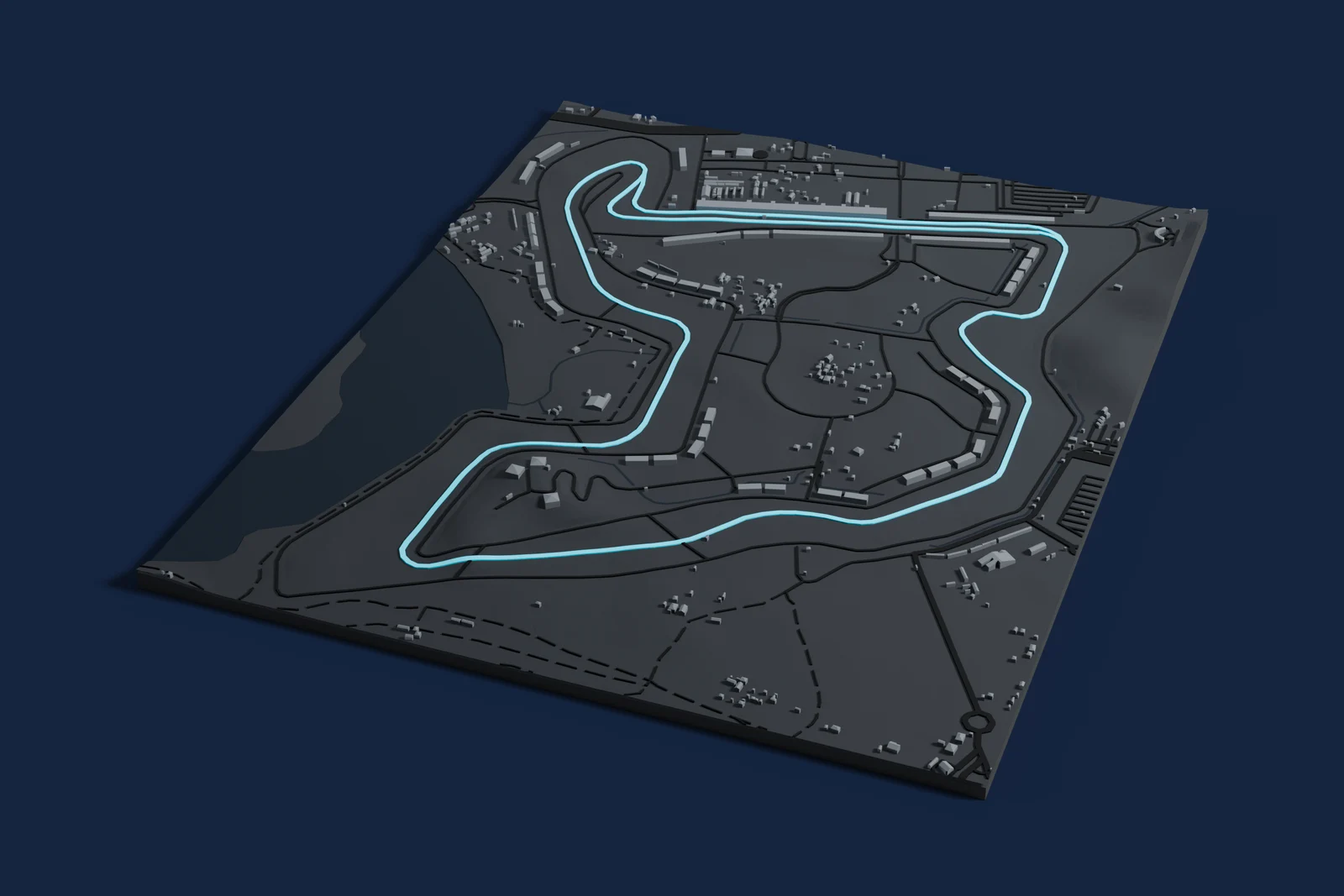 Render of a 3D printed map of Mandalika International Street Circuit, the track in cyan on a dark grey model of the land and buildings around it.