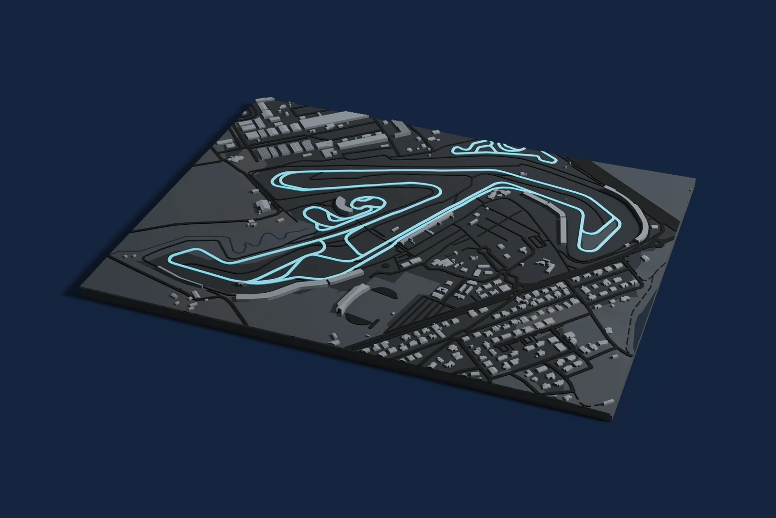 Render of a 3D printed map of Misano World Circuit, the track in cyan on a dark grey model of the land and buildings around it.