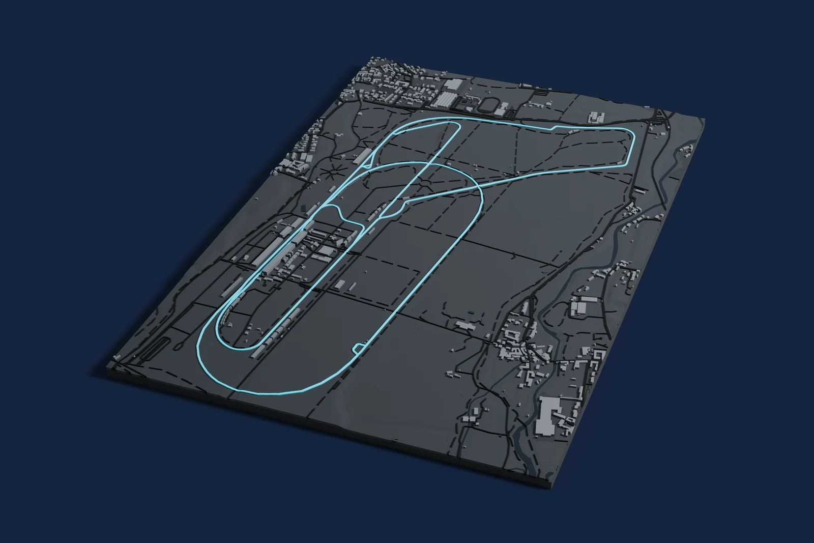 Render of a 3D printed map of Monza Circuit, the track in cyan on a dark grey model of the land and buildings around it.
