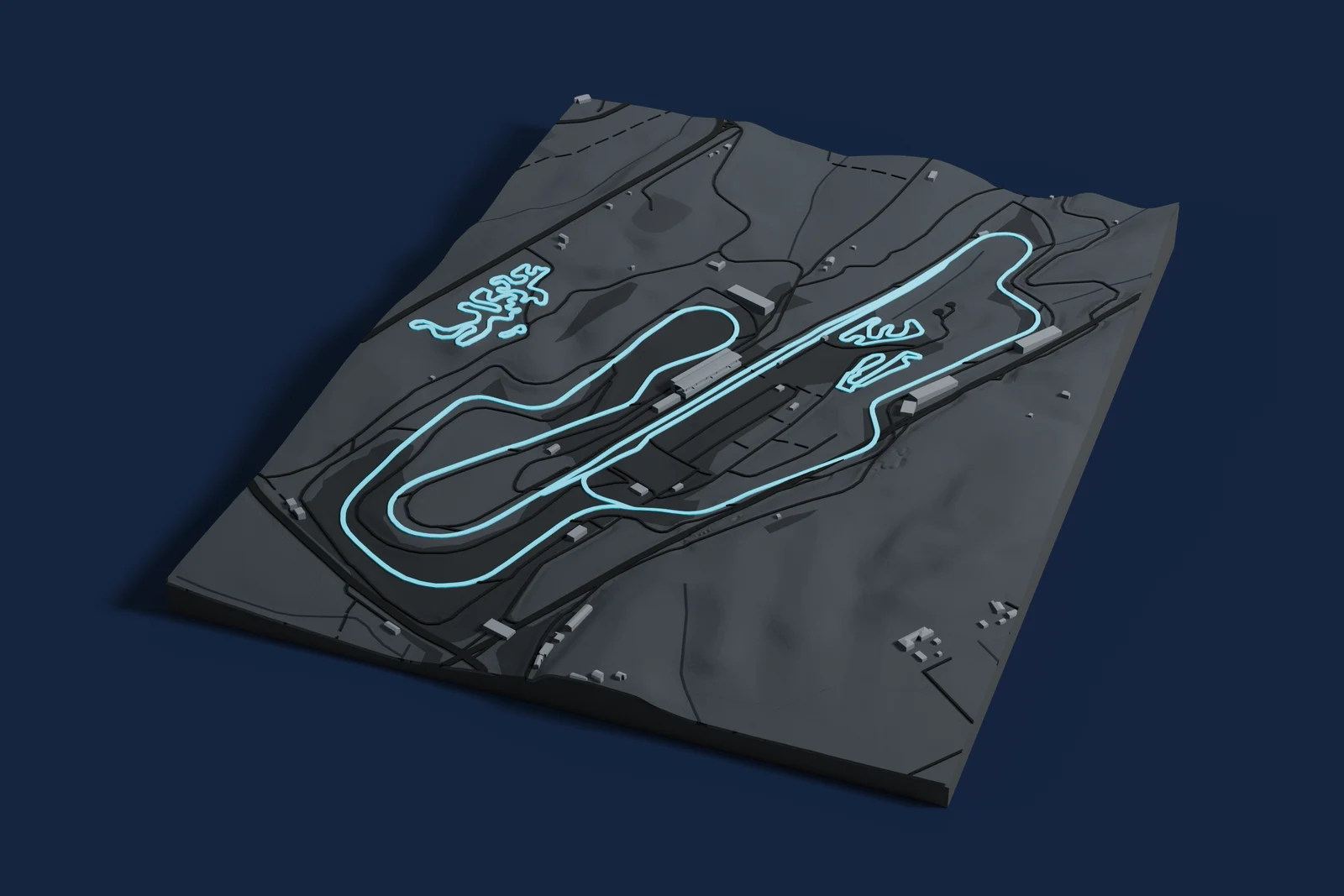 Render of a 3D printed map of Mugello Circuit, the track in cyan on a dark grey model of the land and buildings around it.