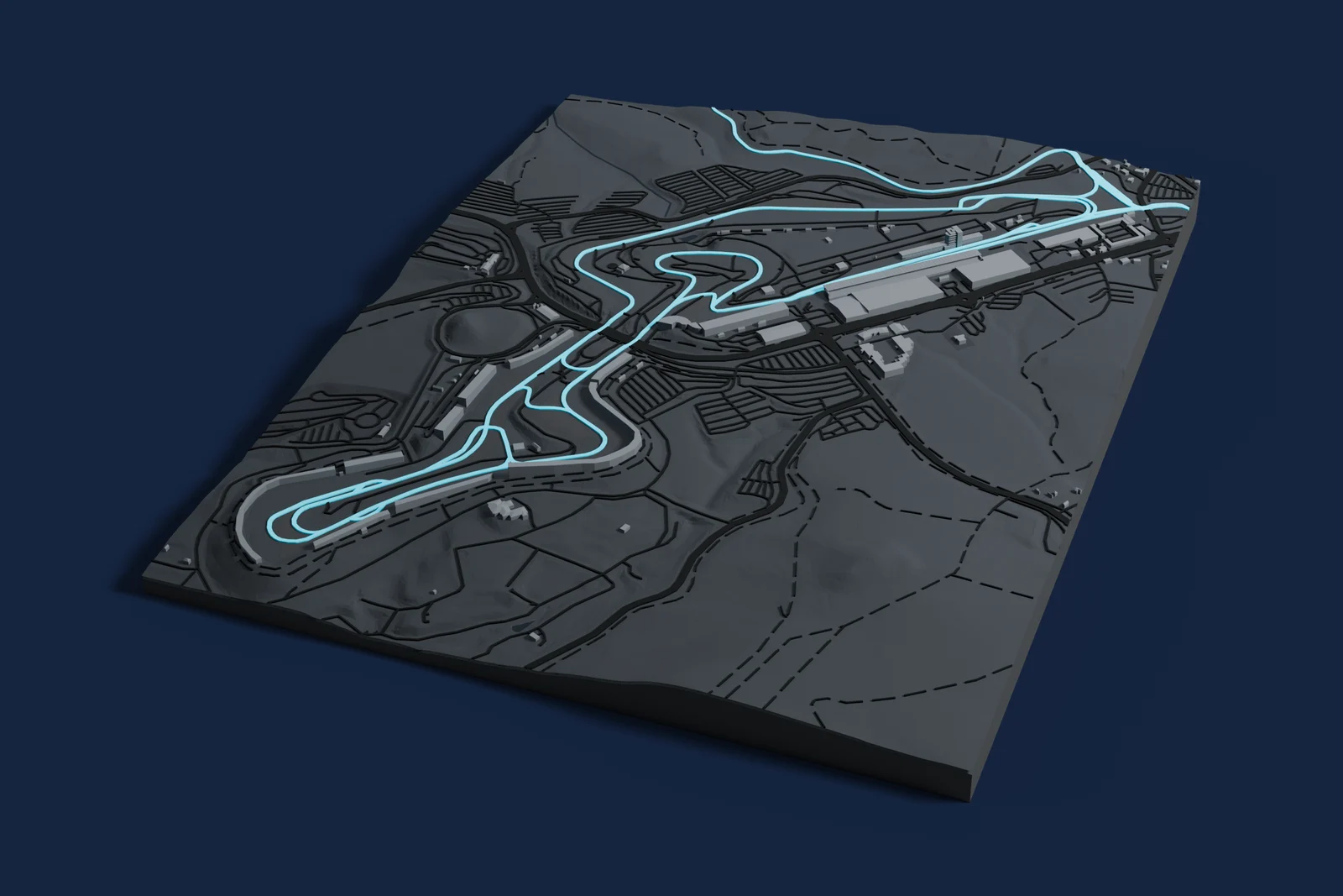Render of a 3D printed map of Nürburgring, the track in cyan on a dark grey model of the land and buildings around it.