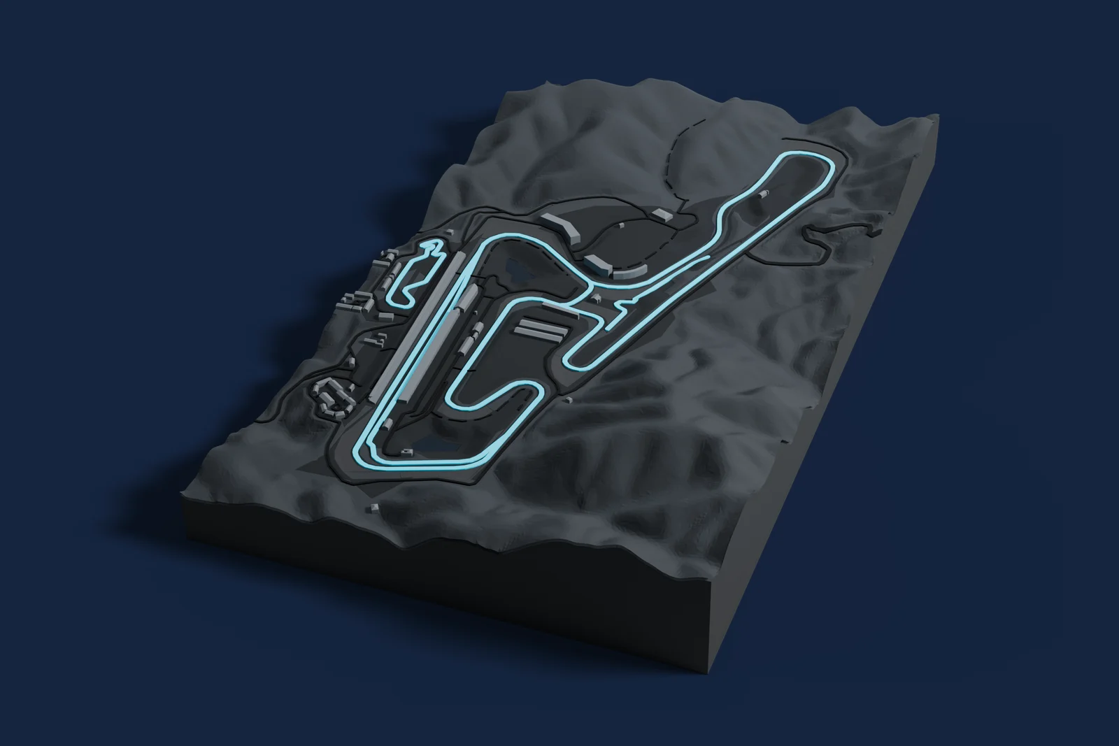Render of a 3D printed map of Okayama International Circuit, the track in cyan on a dark grey model of the land and buildings around it.