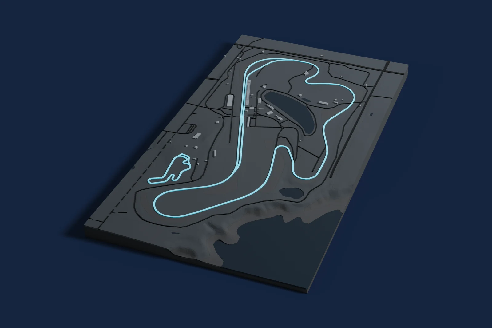 Render of a 3D printed map of Phillip Island Grand Prix Circuit, the track in cyan on a dark grey model of the land and buildings around it.