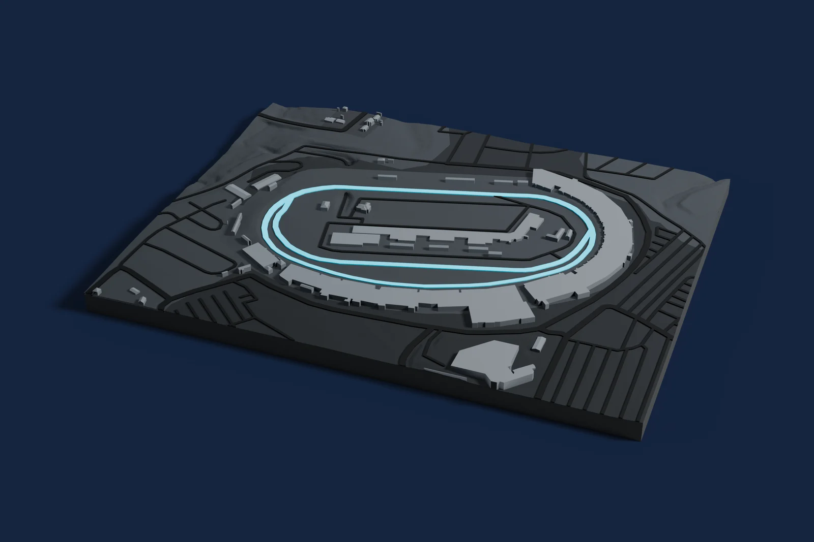 Render of a 3D printed map of Richmond Raceway, the track in cyan on a dark grey model of the land and buildings around it.