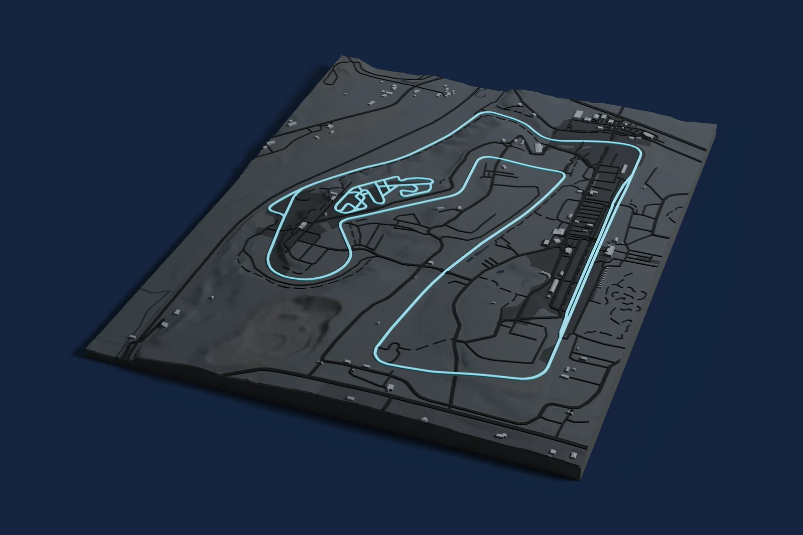 Render of a 3D printed map of Road America, the track in cyan on a dark grey model of the land and buildings around it.