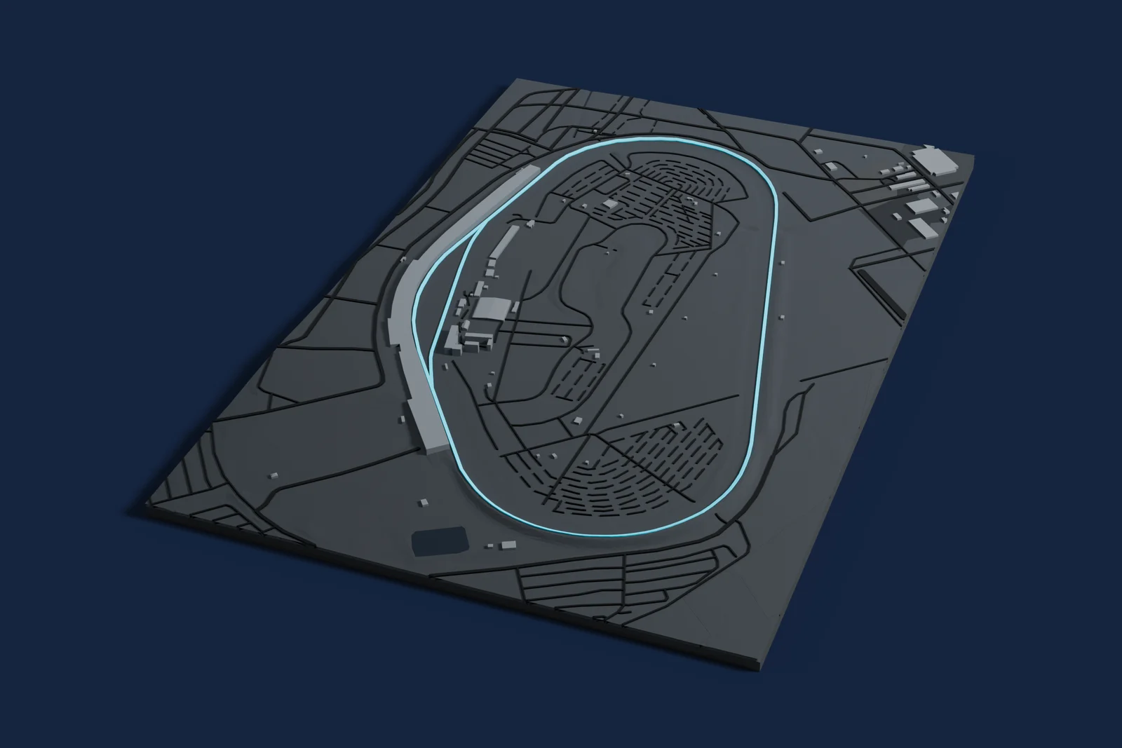 Render of a 3D printed map of Talladega Superspeedway, the track in cyan on a dark grey model of the land and buildings around it.