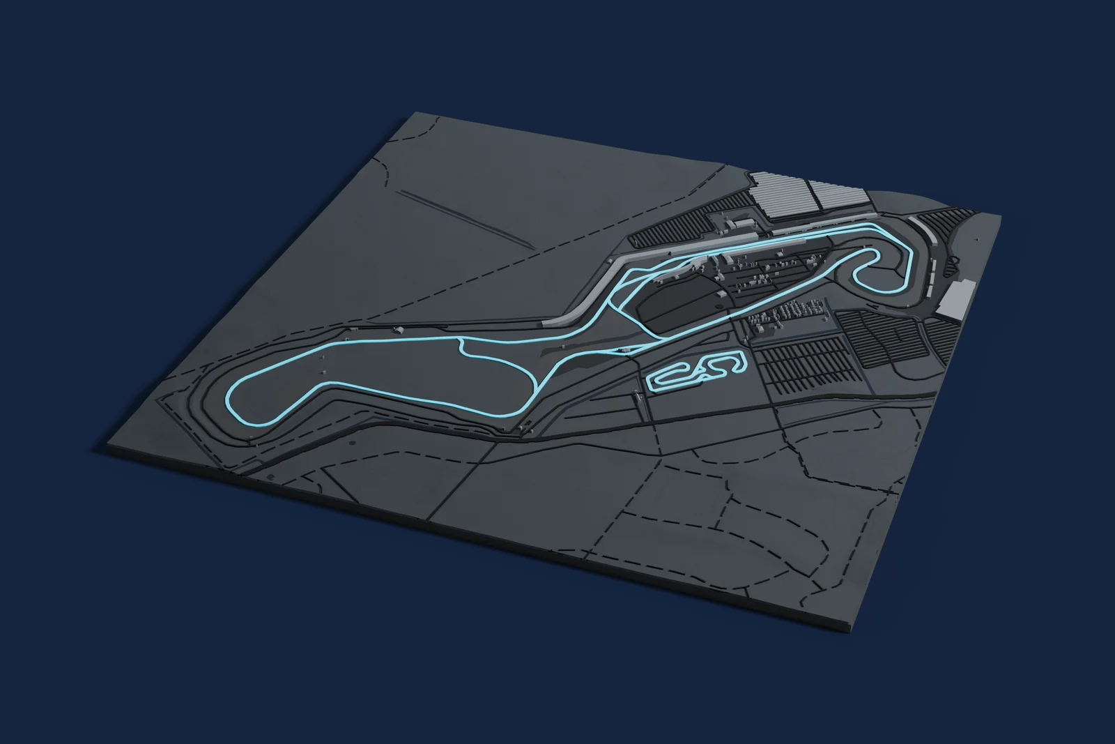 Render of a 3D printed map of TT Circuit Assen, the track in cyan on a dark grey model of the land and buildings around it.