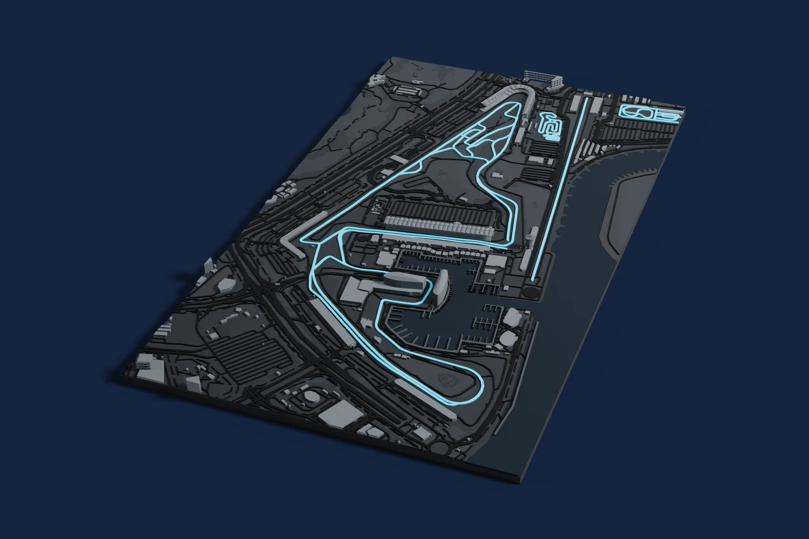 Render of a 3D printed map of Yas Marina Circuit, the track in cyan on a dark grey model of the land and buildings around it.