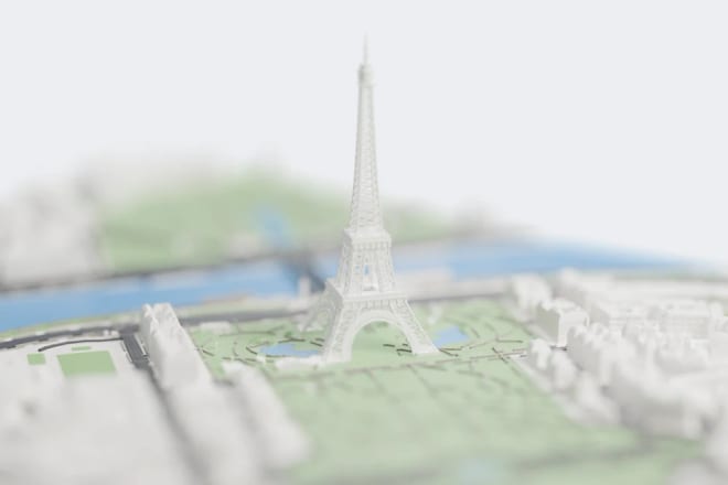 O modelo da Torre Eiffel sobre o Campo de Marte.